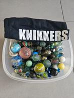 Knikkers in bakje met zakje, Ophalen of Verzenden