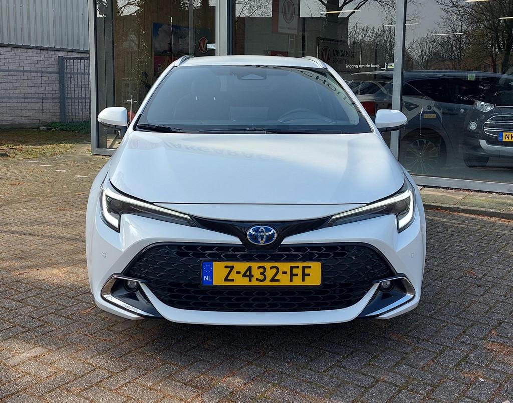 Toyota Corolla Touring Sports Hybrid 140 Business Plus, Auto's, Toyota, 450 kg, Gebruikt, 4 cilinders, Wit
