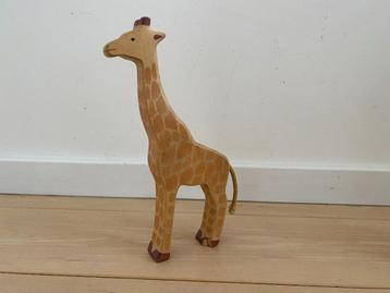 Holztiger grote giraffe beschikbaar voor biedingen
