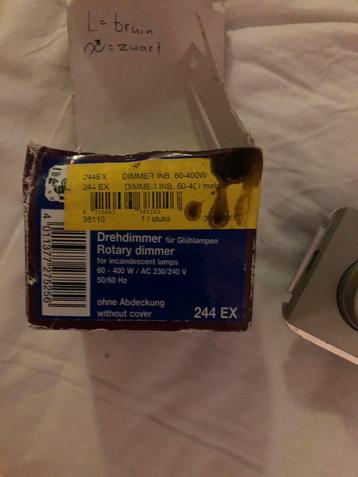 Twee dimmers  1xwit 1x zilver / nieuw oerdegelijke beschikbaar voor biedingen