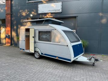 Fraaie èn complete Kip Kompakt 37ekv met hefdak en toilet! beschikbaar voor biedingen
