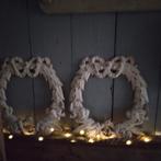 2 gietijzeren kransen, Ophalen