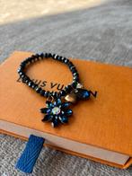 Leuk armbandje, Ophalen of Verzenden, Zo goed als nieuw, Blauw, Met bedels of kralen
