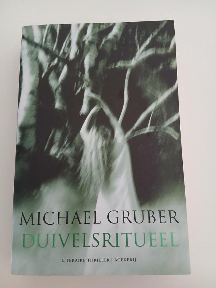 Michael Gruber - Duivelsritueel, Boeken, Thrillers, Zo goed als nieuw, Ophalen of Verzenden