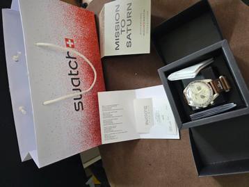 Swatch moomswatch omega mission to Saturn beschikbaar voor biedingen