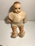 Antieke porseleinen baby pop, Ophalen