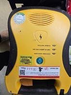 Defibrillator AED apparaat inclusief kast, Diversen, Verpleegmiddelen, Ophalen of Verzenden, Zo goed als nieuw