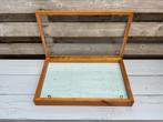 Platte display case vitrine, Ophalen