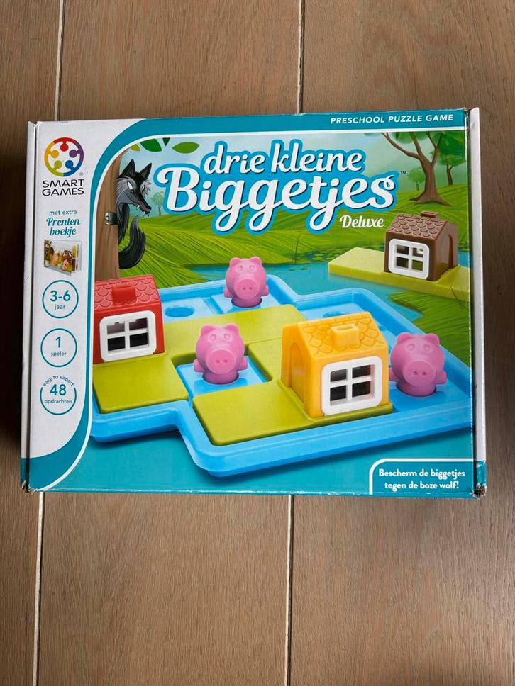 Drie Kleine Biggetjes Deluxe - Bordspel, Hobby en Vrije tijd, Gezelschapsspellen | Bordspellen, Nieuw, Een of twee spelers, Reisspel