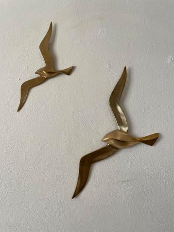 Messing vogels voor aan de muur beschikbaar voor biedingen