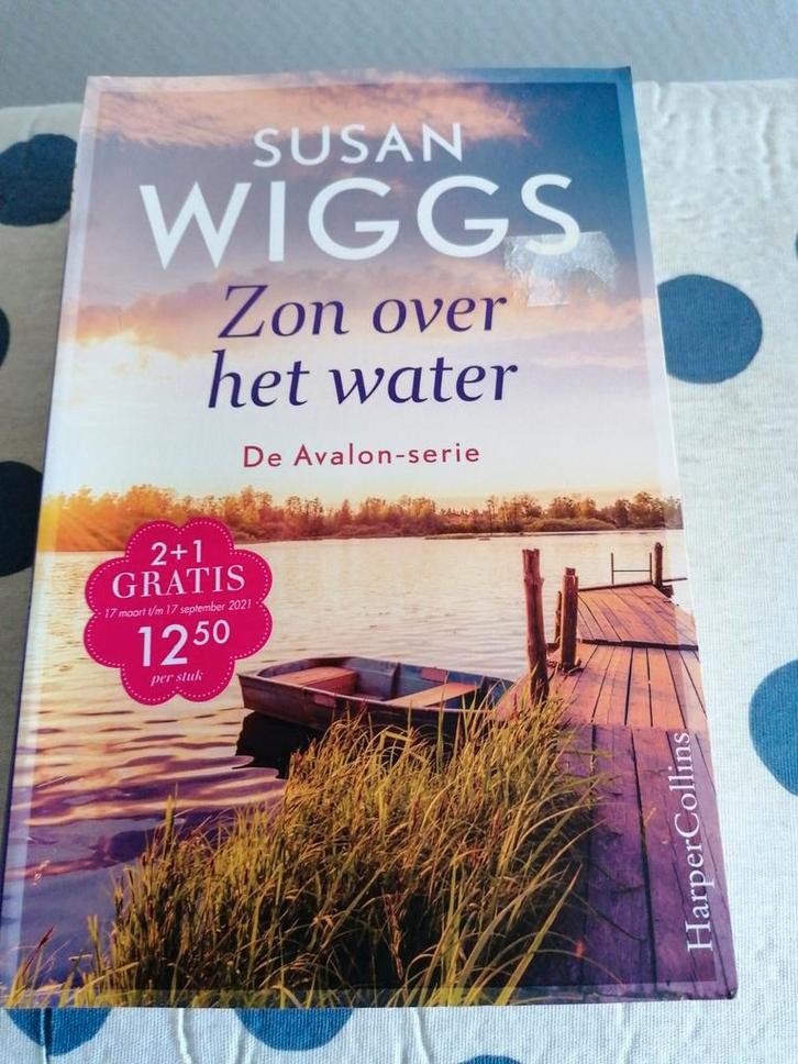 Susan Wiggs - Zon over het water, Boeken, Literatuur, Zo goed als nieuw, Ophalen of Verzenden