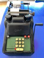 Antieke optelmachine  Addo X, Ophalen