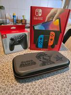Nintendo Switch OLED Rood/Blauw, Spelcomputers en Games, Spelcomputers | Nintendo Switch, Ophalen, Zo goed als nieuw, Met 1 controller