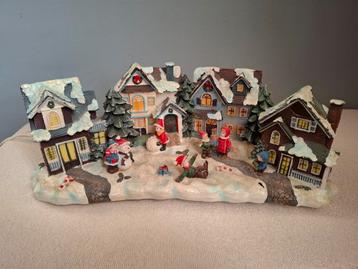 Kerstdorp met verlichting  beschikbaar voor biedingen