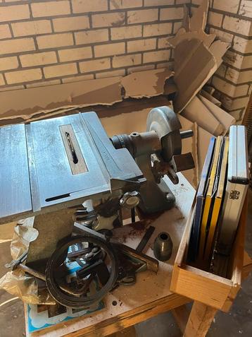 Tafelzaag met slijpschijf en boorkop beschikbaar voor biedingen