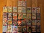 Complete Pokemon collectie + map met non holo trainers., Ophalen of Verzenden, Zo goed als nieuw, Meerdere kaarten
