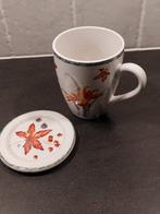 Theekopje + theetip van Janneke Brinkman., Huis en Inrichting, Keuken | Servies, Ophalen, Zo goed als nieuw, Overige stijlen, Kop(pen) en/of Schotel(s)