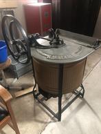 Antieke wasmachine, Ophalen