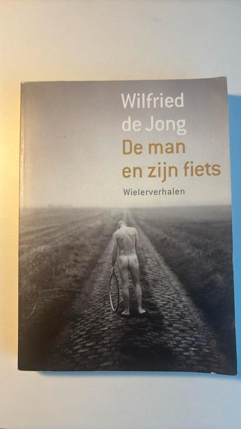 Wilfried de Jong - De man en zijn fiets, Boeken, Sportboeken, Gelezen, Lopen en Fietsen, Ophalen of Verzenden