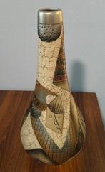 Decoratieve vaas met gezicht, Ophalen