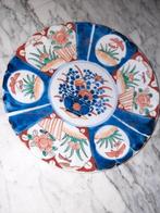 Imari bord en vaas, Ophalen