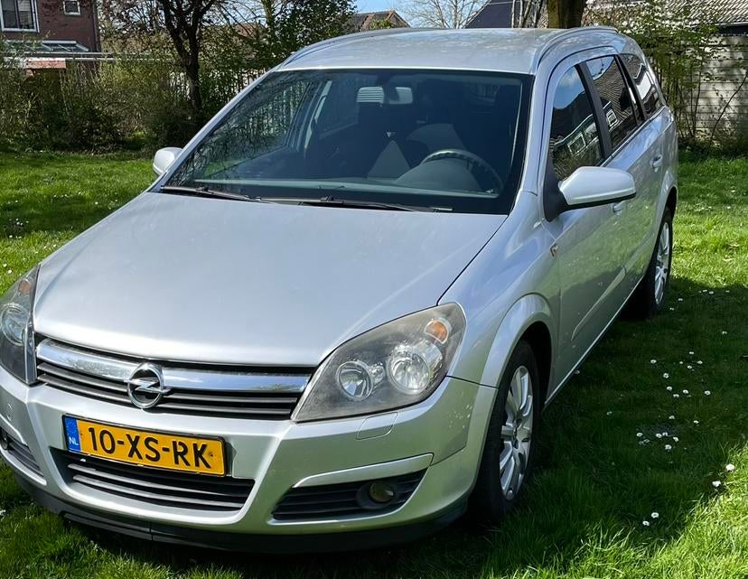 Opel Astra 1.8 16V St.wgn AUT 2007 Grijs, Auto's, Stof, Zwart, 4 cilinders, 1796 cc