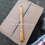 Ruggekrabber van hout, Ophalen