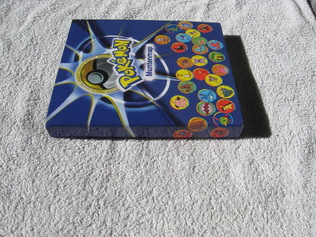 Pokémon verzamelmap MUNTEN met 39 (van 48) munten, Ophalen of Verzenden, Gebruikt, Overige typen