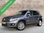 Volkswagen Tiguan 1.4 TSI Sport&Style Trekhaak | navigatie |, Auto's, Volkswagen, Euro 5, Stof, Zwart, 4 cilinders