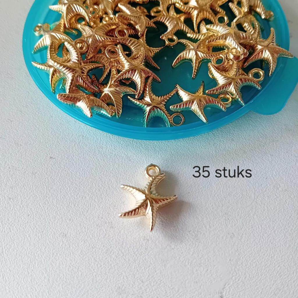 35 bedeltjes zeester nieuw, Sieraden, Tassen en Uiterlijk, Bedels, Overige merken, Overige materialen, Nieuw, Ophalen of Verzenden