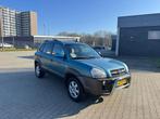 Hyundai Tucson 2.0i 4WD Style. 4X4, Auto's, Stof, Gebruikt, 4 cilinders, Blauw