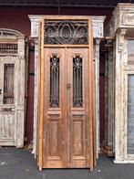 Antieke dubbele deur in kozijn met bovenlicht en smeedijzer, Ophalen of Verzenden, Gebruikt