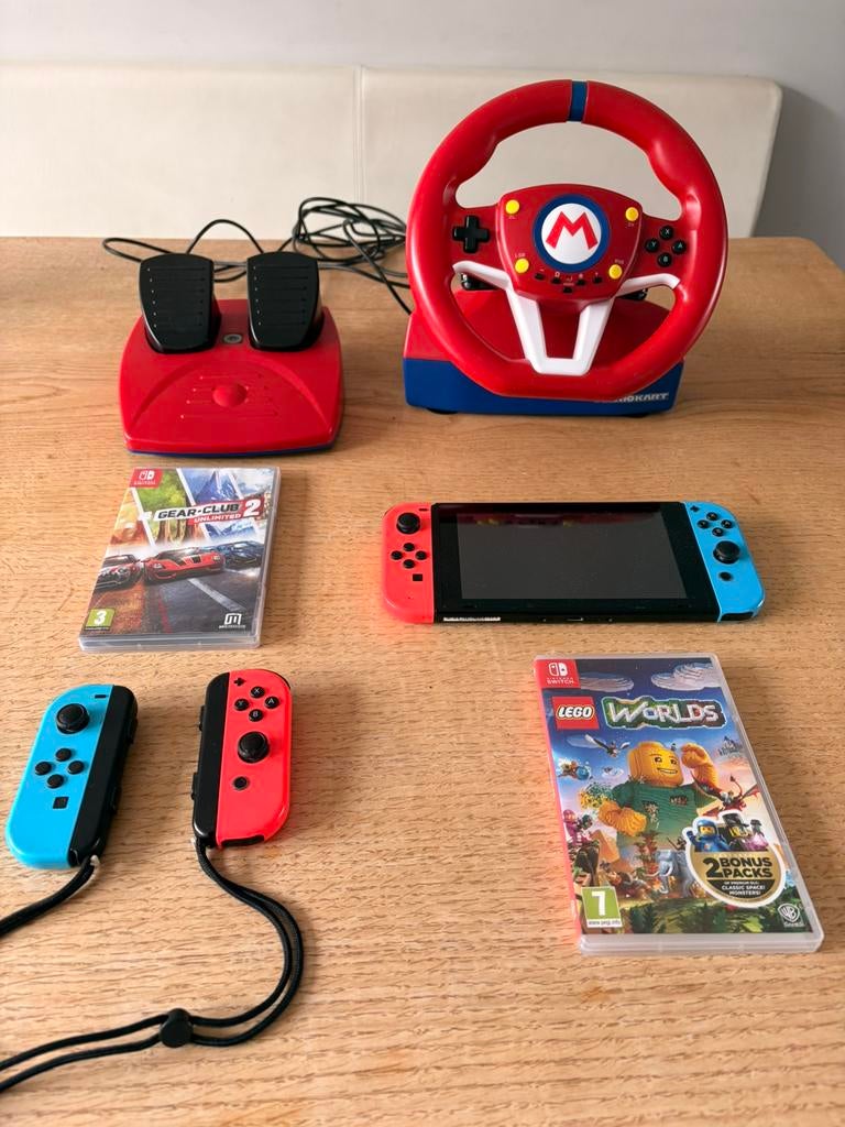 Nintendo Switch met 2 extra controllers, stuur en 2 games, Spelcomputers en Games, Spelcomputers | Nintendo Switch, Ophalen of Verzenden