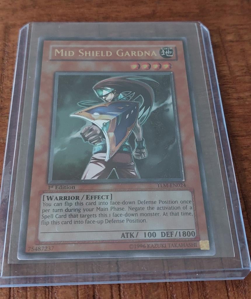 Yu-Gi-Oh! Mid Shield Gardna 1st Edition TLM-EN024 Foil, Ophalen of Verzenden, Zo goed als nieuw, Losse kaart, Foil