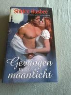 Shirlee Busbee-gevangen in het maanlicht, Ophalen of Verzenden, Zo goed als nieuw