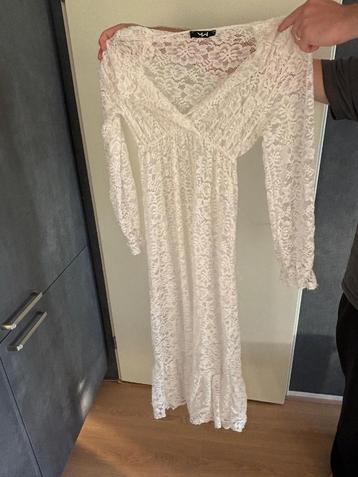 Lange jurk beschikbaar voor biedingen