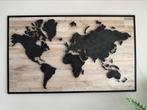 Schilderij wereldkaart, Ophalen