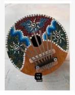 Mooi muziek instrument gemaakt halve kokosnoot kleuren 14 cm, Ophalen of Verzenden
