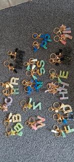 Nieuw leuke vrolijke letter sleutelhanger., Ophalen of Verzenden, Nieuw