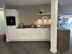 Opheffingsuitverkoop! Hoogglans witte keuken met Dekton blad, Ophalen, Overige materialen, Wit, Hoekkeuken