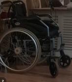 Rolstoel zonder voeten plankjes, Ophalen