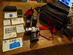 Camera Minolta X-300 set, incl lenzen, flitser + 2e camera, Audio, Tv en Foto, Fotocamera's Analoog, Ophalen of Verzenden, Gebruikt