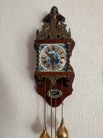 Zaanse Klok met Delfts Blauwe Wijzerplaat, Ophalen