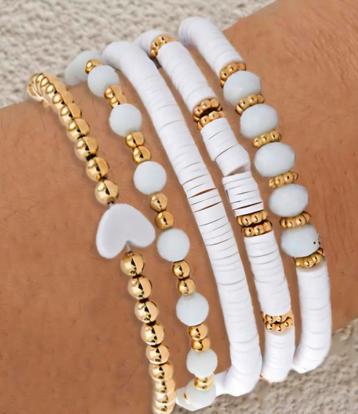 Set 5 witte met goud kleur armbanden nieuw beschikbaar voor biedingen