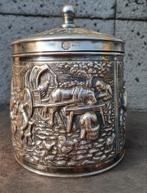 Douwe Egberts theebus antiek, Zilverkleurig met reliëf, Antiek en Kunst, Antiek | Goud en Zilver, Ophalen of Verzenden