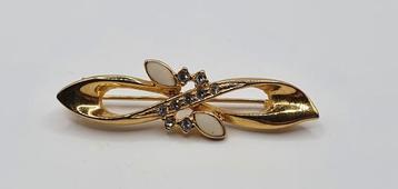 Vintage goudkleurige broche beschikbaar voor biedingen