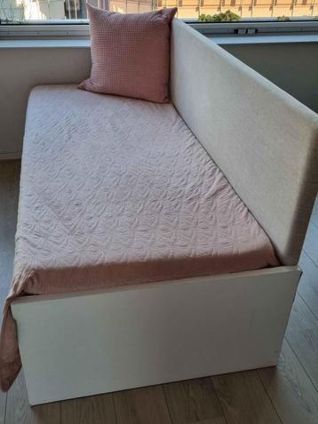 Ikea one-person bed with an underbed