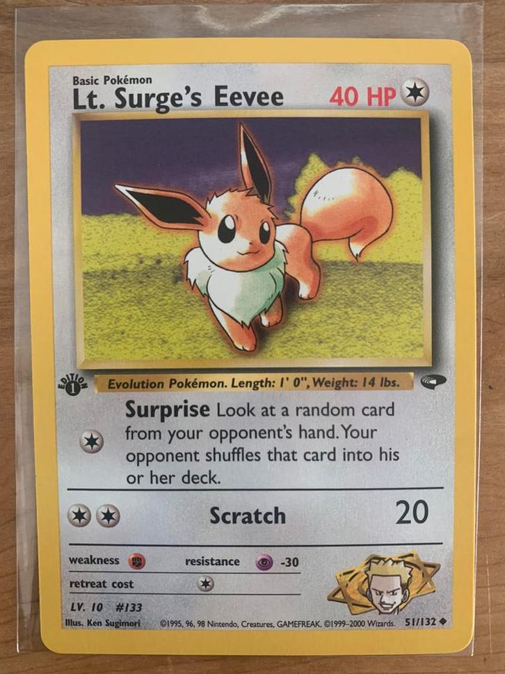 Lt. Surge's Eevee first edition 51/132, Hobby en Vrije tijd, Verzamelkaartspellen | Pokémon, Zo goed als nieuw, Losse kaart, Verzenden