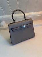 Kelly, Sieraden, Tassen en Uiterlijk, Tassen | Damestassen, Ophalen of Verzenden, Zo goed als nieuw, Beige