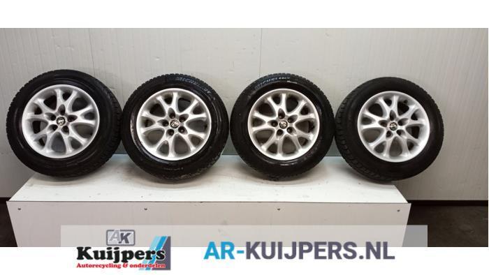 Sportvelgenset + winterbanden van een Alfa Romeo 147, Auto-onderdelen, Banden en Velgen, Gebruikt